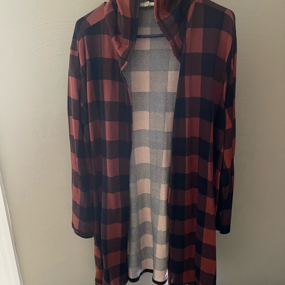 Soft, stretchy long open front cardigan.